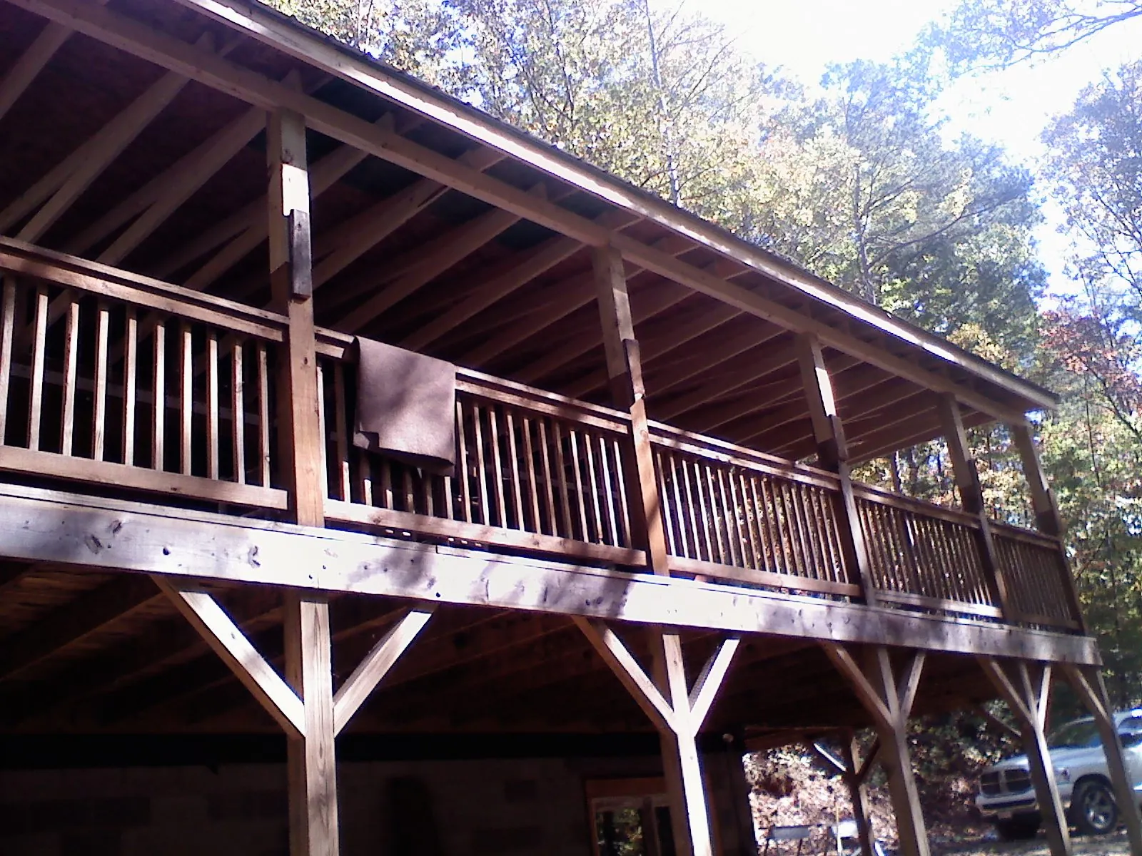 Timber framing under a new elevated porch and deck — Roof Leak Repair in Las Animas by Roofing Brothers